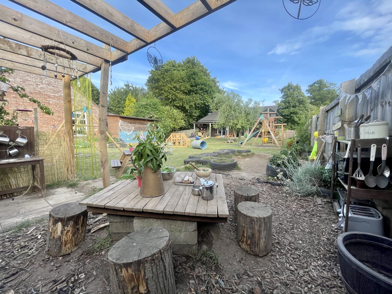 Photo of a table in a mud kitchen