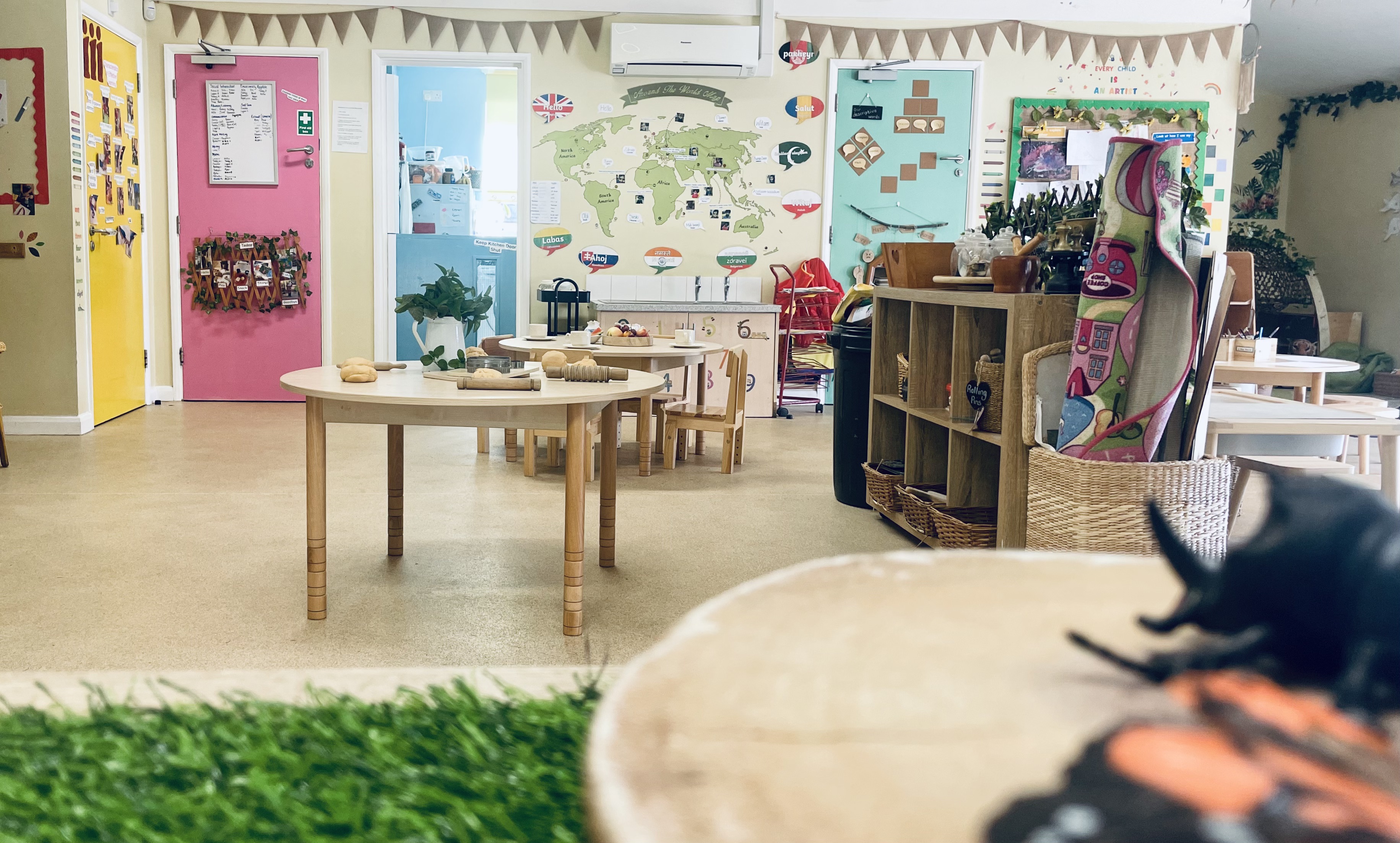 Indoor preschool photo showing some activity stations